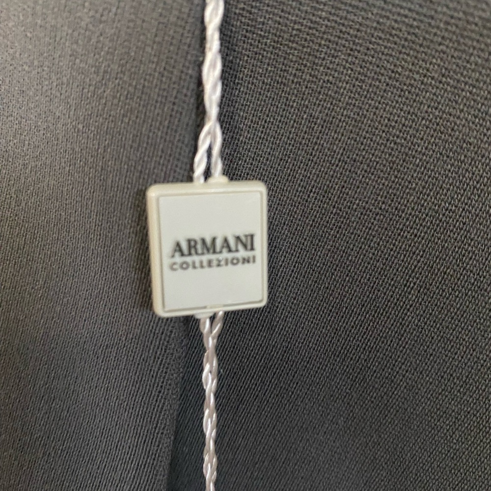 Armani Collezioni Two-Piece Skirt Suit
Grey
Button Closure at Front